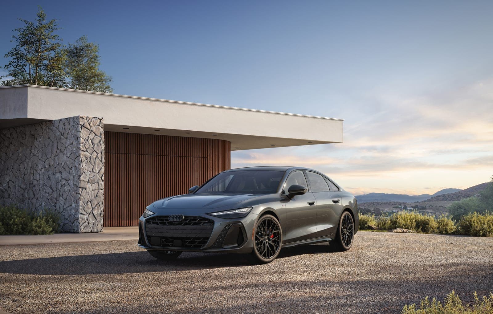 The ninth-gen A6 trades fussy detailing for clean surfacing and a low, tapered roofline.