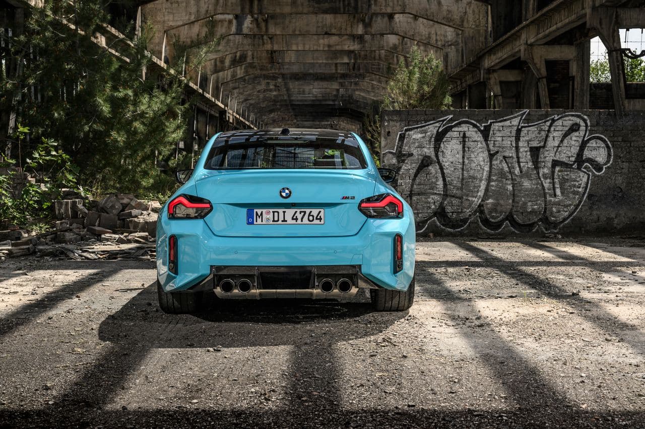 Rear view of the 2027 BMW M2 xDrive showing the quad exhaust tips and rear diffuser.